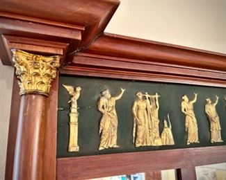 Mirror with carved gold figures