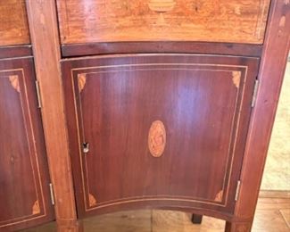 Vintage inlaid wood buffet w/3 drawers and four doors. Inlays include conch shell.