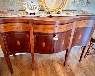 Vintage inlaid wood buffet w/3 drawers and four doors. Inlays include conch shell.