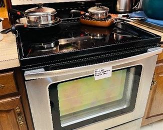 - Amana Range Glass Cooktop Stainless Steel Stove - in excellent working condition - about 5 years old 