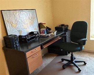 Nice office set up desk chair and the floor cover. And printer.