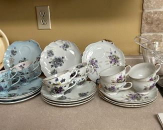 Three different sets of 4 cups and sandwich plates . Lefton 