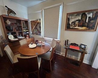 Skovby Dining set with expandable table.

Don Alquire Mirror
Jacques Pergel cityscape
Handmade natural wood side table
