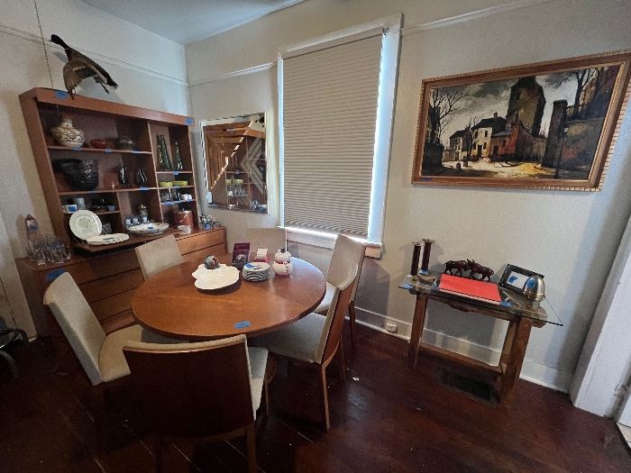 Skovby Dining set with expandable table.

Don Alquire Mirror
Jacques Pergel cityscape
Handmade natural wood side table
