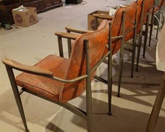 $40 (4)Mid Century Orange Vinyl Chairs (2) Arm Chairs (2)