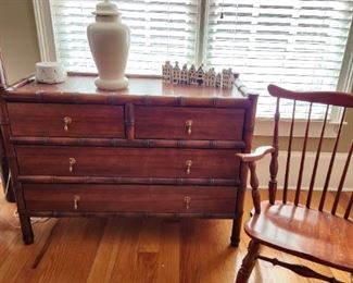 Antique 4 drawer chest w/ bamboo detailing. Leave as is or paint for an MCM or bohemian style. Classic spindle back antique rocker.