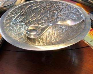 Hand made close up pewter salsa bowl and spoon