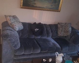 Blue living room sofa also has matching reclining chair