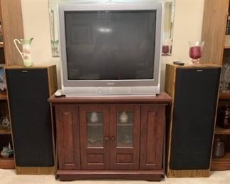 Toshiba TV, TV cabinet, and Sony speakers