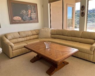 Leather sectional sofa with Broyhill coffee table. 