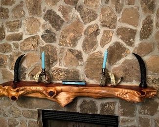 Decor and wooden mantle, rock and fireplace metal box