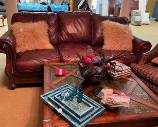 Leather couch, decor pillows and decor