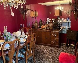Chandelier, Queen Anne table, 2 leaves, pad and 6 chairs, dishes, vintage chair. Credenza. Fritz and Floyd pheasant, monkey lamps and ginger jars. 8X6 mirror