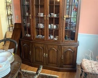 walnut china cabinet with interior above lighting 