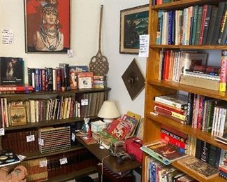 We have a great little library for you. Some of the topics include music, black history, art books, encyclopedias, antique books, history, large coffee table books, carpet & rug beater, elephant plant stand, a book on Pyrex , vintage toys & books, 
Plus a huge collection of Cowboys & Indians magazine with great cover art!!
And the very unique original painting , quilt beater 