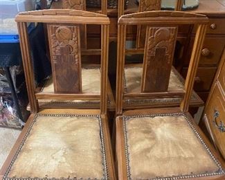 There are 6 of these chairs - very unique hand carved back with a fruited floral art deco design. 