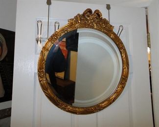 Gold Mirror with Bow Frame $125