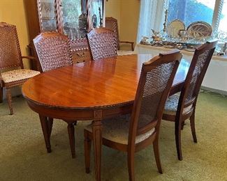 Dining table - 3 leaves and 6 chairs - (2 are arm chairs)