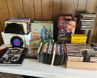 33 records,  CD's, DVD's