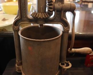 Cast iron sausage stuffer fruit press lard press