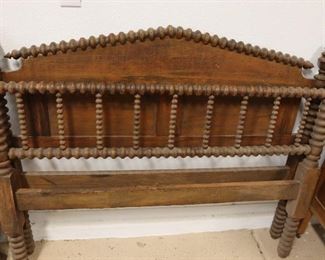 Turned wooden bed frame