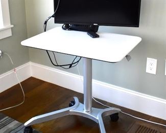 Adjustable computer desk