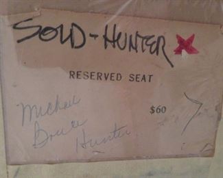 Label on backside of Mchael Bruce Hunter painting