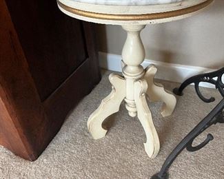 four-footed marble topped stool table