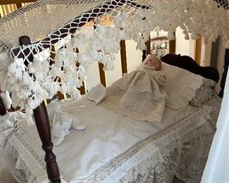 antique child's canopy bed