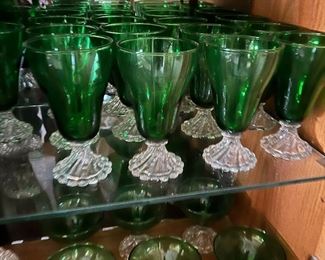green stemmed wine tea glasses