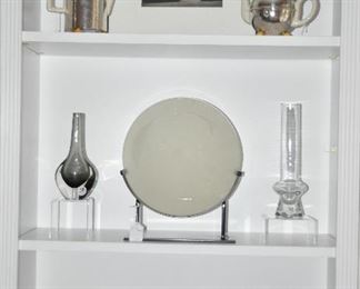 Stunning Vintage Bauhaus Hutschenreuther Insulated Porcelain Coffee & Tea Pots in Hammered Metal (SOLD) as well as Another Solid Lighthouse Lens 15", on Stand and  a Orrefors (SOLD) and Waterford Crystal Bud Vases, as well as a Murano Glass Vase & a Phenomenal MetalLace Serving Piece (SOLD).
