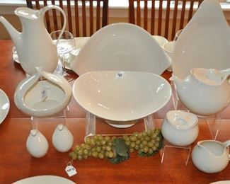 Fabulous Collection of Crate and Barrel Eva Zeisel Ivory Serving Pieces Available Including a 2 Handle 14" Serving Platter (4 Available), a Coffee Pot, Tea Pot (2 Available), Cream and Sugar Set (2 Available), Salt and Pepper Set (2 Available), Large 11" Serving Bowl (2 Available), Small Serving Bowl and a Single Handle 12.5" Serving Platter (2 Available). Also Available are 11 Additional Coffee Mugs!!