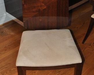 Front View of one of the 6 Gorgeous Dining Chairs with Beige Suede Seats