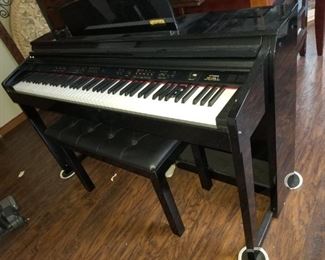 Artesia electronic upright piano