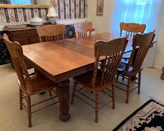 #1 Oak table with 6 chairs and 3 leaves 42-74x42x29 $175.00