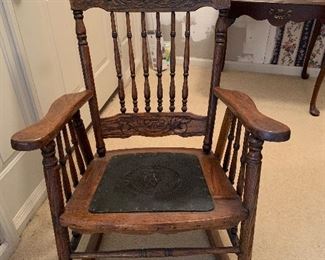 	#13	Oak rocking chair with leather seat	 $40.00 				