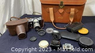 wvintage camera with accessories and leather train case3741 t