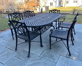 Metal patio table and 6 chairs