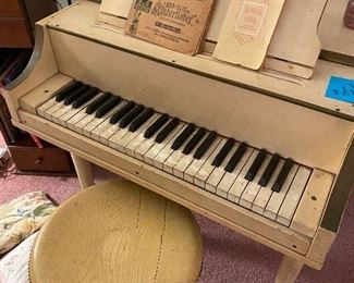 UNIQUE ANTIQUE CHILDS GRAND PIANO WITH OAK PIANO STOOL (HAS CAST IRON SOUND BOARD ) 