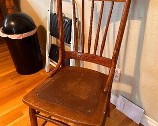 Antique Carved Wood Chair with Decorated Leather Seat