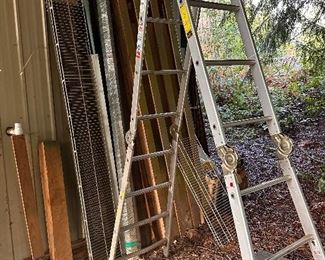 Assorted ladders, lumber, wood, and other construction supplies