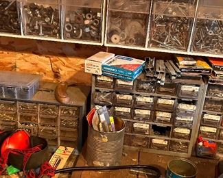 Assorted tools, nuts, bolts, camping supplies, and more