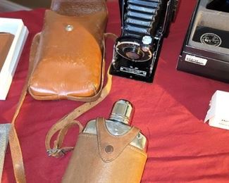Vintage Poloroid camera, Bosca flask