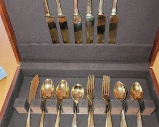 Dirigold flatware set (6 - 4 piece settings with extra pcs)