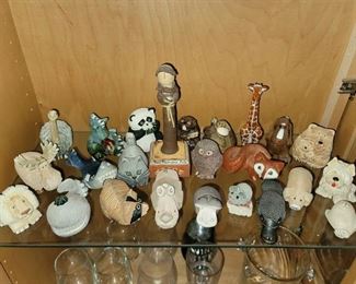 Collection of Rinconada pottery animals from travels around the world
