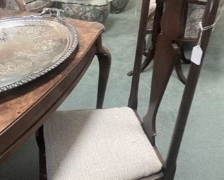 One of two matching dining chairs