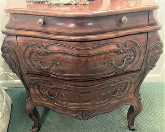 One of two matching Bombay style end tables