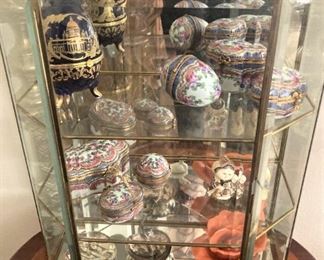 Hinged enamel boxes and eggs