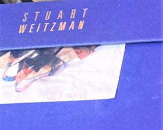Many Stuart Weitzman shoes 