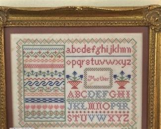 Framed and matted cross-stitch
